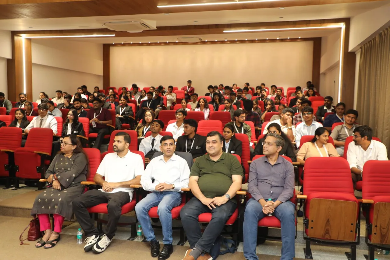 Participants seated in an auditorium during a community event